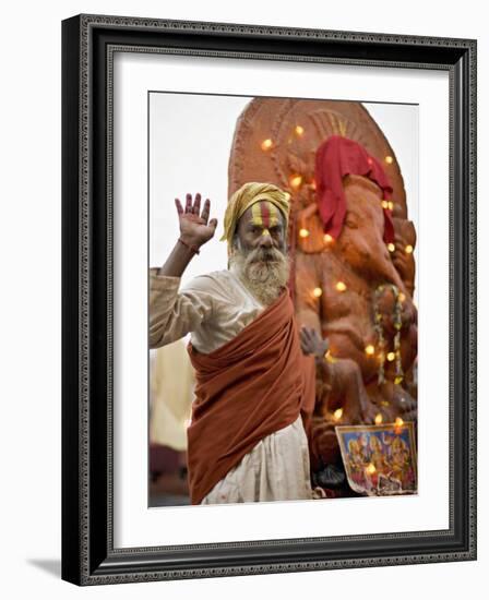 Holy Man in Front of a Ganesh Statue Draped in Fairy Lights at the Hindu Festival of Shivaratri-Don Smith-Framed Photographic Print