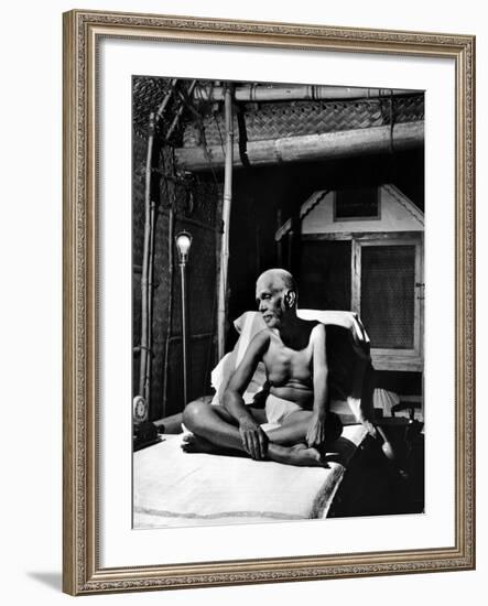 Holy Man Sri Ramana Maharshi Sitting in Bed-Eliot Elisofon-Framed Photographic Print