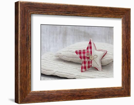 Home-made Christmas jewelry on cushion, still life-Andrea Haase-Framed Photographic Print