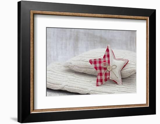 Home-made Christmas jewelry on cushion, still life-Andrea Haase-Framed Photographic Print