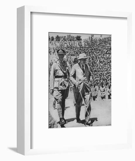 'Home via the Battlefields - Mr Churchill in the ancient Roman amphitheatre at Carthage', 1943-44-Unknown-Framed Photographic Print