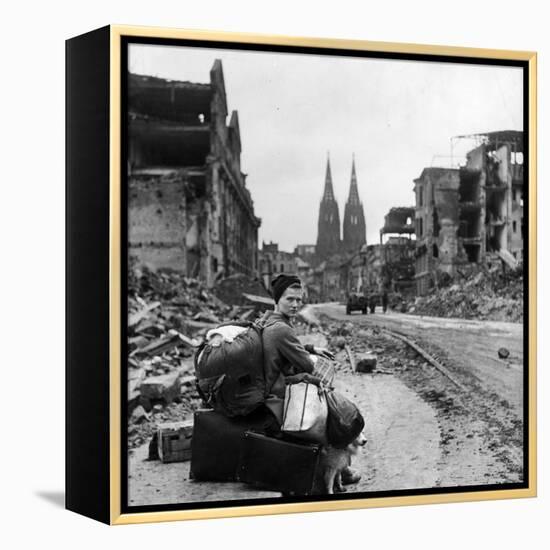 Homeless Refugee German Woman Sitting with All Her Worldly Possessions on Side of a Muddy Street-John Florea-Framed Premier Image Canvas