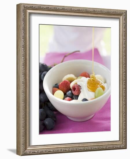 Honey Running onto Fruit Muesli with Yoghurt-null-Framed Photographic Print