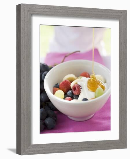 Honey Running onto Fruit Muesli with Yoghurt-null-Framed Photographic Print