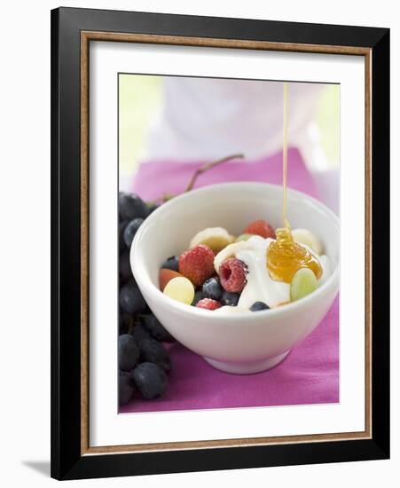 Honey Running onto Fruit Muesli with Yoghurt-null-Framed Photographic Print