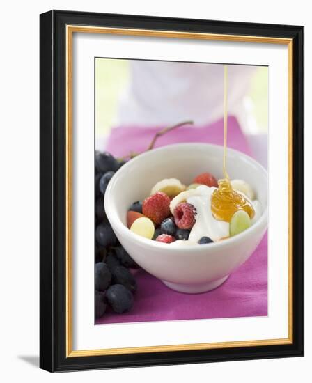 Honey Running onto Fruit Muesli with Yoghurt-null-Framed Photographic Print