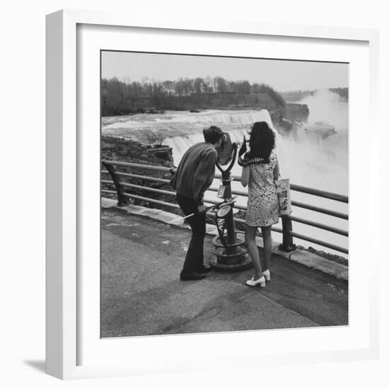 Honeymoon Couple, Colman Laposa Jr. and Wife, Gazing at the Niagara Falls-Yale Joel-Framed Photographic Print