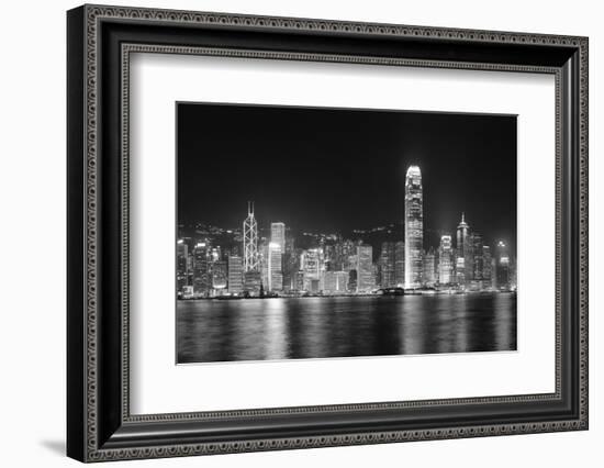 Hong Kong City Skyline at Night over Victoria Harbor with Clear Sky and Urban Skyscrapers.-Songquan Deng-Framed Photographic Print