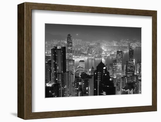 Hong Kong City Skyline at Night with Victoria Harbor and Skyscrapers Illuminated by Lights over Wat-Songquan Deng-Framed Photographic Print