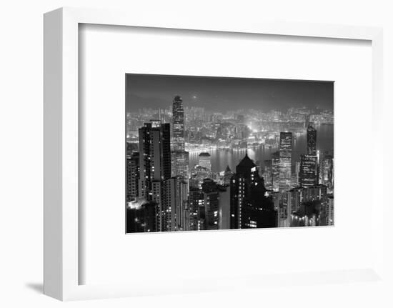 Hong Kong City Skyline at Night with Victoria Harbor and Skyscrapers Illuminated by Lights over Wat-Songquan Deng-Framed Photographic Print