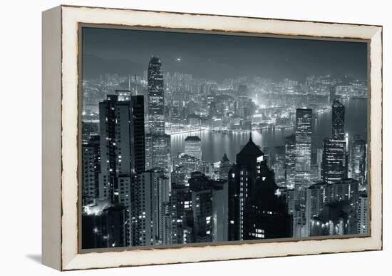 Hong Kong City Skyline At Night With Victoria Harbor And Skyscrapers Illuminated-Songquan Deng-Framed Stretched Canvas