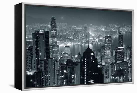 Hong Kong City Skyline At Night With Victoria Harbor And Skyscrapers Illuminated-Songquan Deng-Framed Stretched Canvas