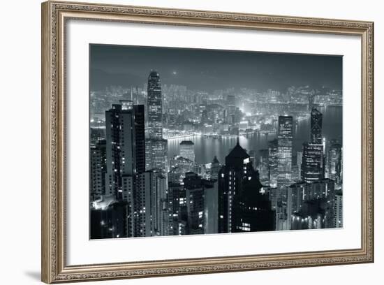 Hong Kong City Skyline At Night With Victoria Harbor And Skyscrapers Illuminated-Songquan Deng-Framed Premium Giclee Print