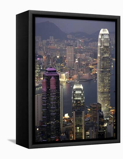 Hong Kong skyline and Victoria Harbor at night-Tibor Bogn?r-Framed Premier Image Canvas