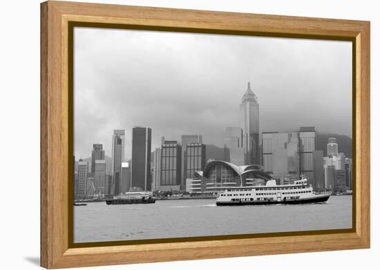 Hong Kong Skyline with Boats in Victoria Harbor in Black and White.-Songquan Deng-Framed Premier Image Canvas