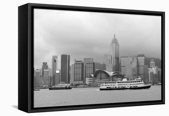 Hong Kong Skyline with Boats in Victoria Harbor in Black and White.-Songquan Deng-Framed Premier Image Canvas