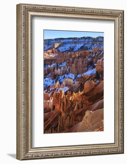 Hoodoos and Snowy Rim Cliffs Lit by Strong Late Afternoon Sun in Winter-Eleanor-Framed Photographic Print