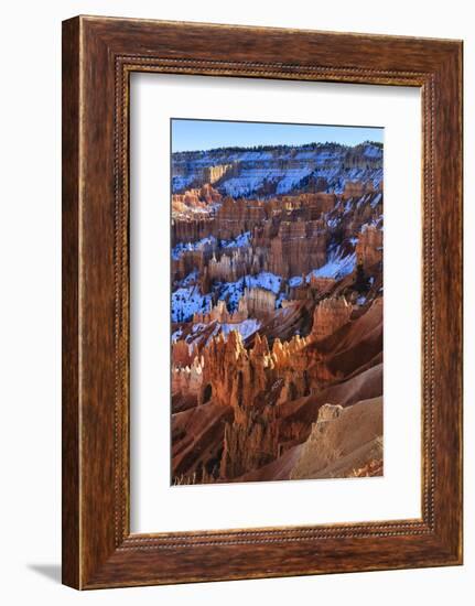 Hoodoos and Snowy Rim Cliffs Lit by Strong Late Afternoon Sun in Winter-Eleanor-Framed Photographic Print