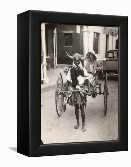 Horned Rickshaw Man in Bulawayo Southern Rhodesia-null-Framed Stretched Canvas