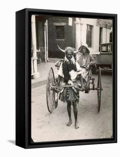 Horned Rickshaw Man in Bulawayo Southern Rhodesia-null-Framed Stretched Canvas