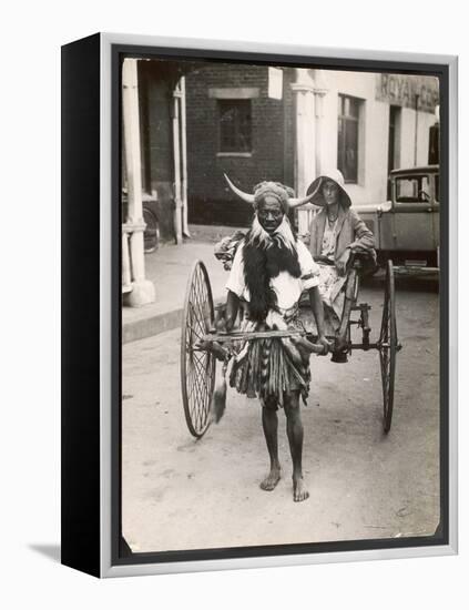 Horned Rickshaw Man in Bulawayo Southern Rhodesia-null-Framed Stretched Canvas