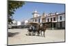 Horse and carriage riding along sand streets with brotherhood houses behind, El Rocio, Huelva Provi-Stuart Black-Mounted Photographic Print