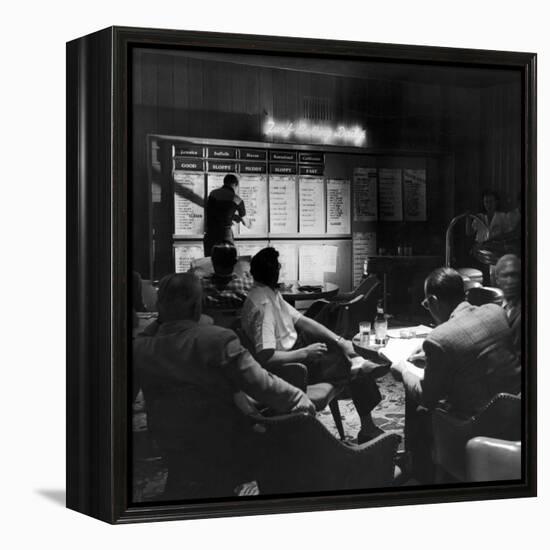 Horse Betting and Bookmakers Going on as a Gambling Option-J^ R^ Eyerman-Framed Premier Image Canvas