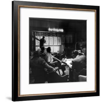 Horse Betting and Bookmakers Going on as a Gambling Option-J. R. Eyerman-Framed Photographic Print
