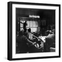 Horse Betting and Bookmakers Going on as a Gambling Option-J. R. Eyerman-Framed Photographic Print
