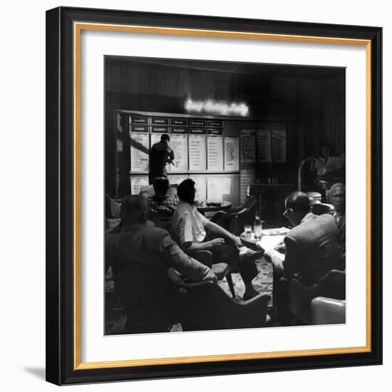 Horse Betting and Bookmakers Going on as a Gambling Option-J^ R^ Eyerman-Framed Photographic Print