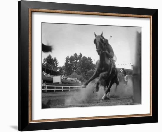 Horse Twisting Its Body as It Hits Turn During Race at Cumberland-Hank Walker-Framed Photographic Print