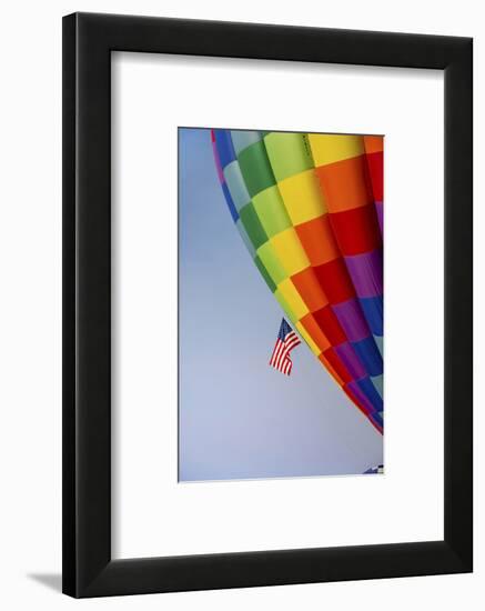 Hot air balloon bringing color to the sky.-Larry Ditto-Framed Photographic Print