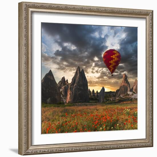 Hot Air Balloon Flying over Red Poppies Field Cappadocia Region, Turkey-Tetyana Kochneva-Framed Photographic Print