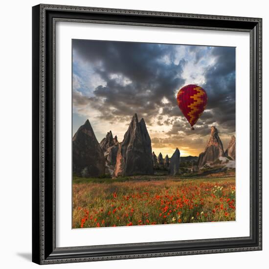 Hot Air Balloon Flying over Red Poppies Field Cappadocia Region, Turkey-Tetyana Kochneva-Framed Photographic Print