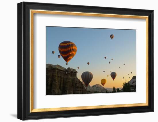 Hot Air Balloons Cruising over Cappadocia, Anatolia, Turkey, Asia Minor, Eurasia-James Strachan-Framed Photographic Print