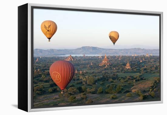 Hot Air Balloons Flying over the Terracotta Temples of Bagan-Annie Owen-Framed Premier Image Canvas