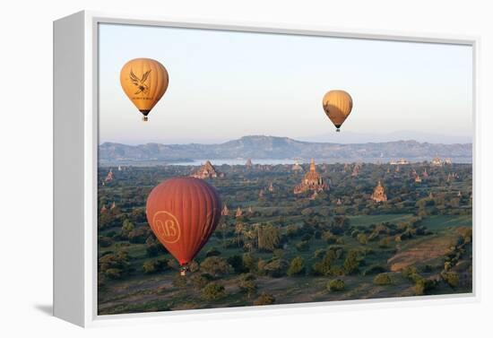 Hot Air Balloons Flying over the Terracotta Temples of Bagan-Annie Owen-Framed Premier Image Canvas