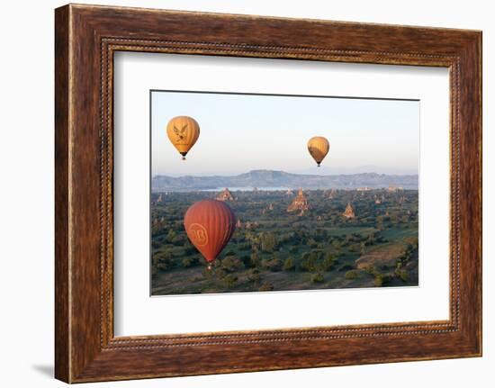 Hot Air Balloons Flying over the Terracotta Temples of Bagan-Annie Owen-Framed Photographic Print