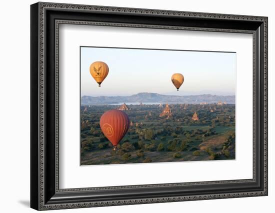 Hot Air Balloons Flying over the Terracotta Temples of Bagan-Annie Owen-Framed Photographic Print