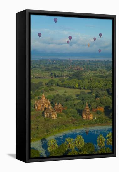 Hot air balloons, morning view of the temples of Bagan, Myanmar.-Michele Niles-Framed Premier Image Canvas