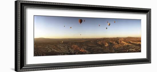 Hot Air Balloons over Landscape at Sunrise, Cappadocia, Central Anatolia Region, Turkey-null-Framed Photographic Print