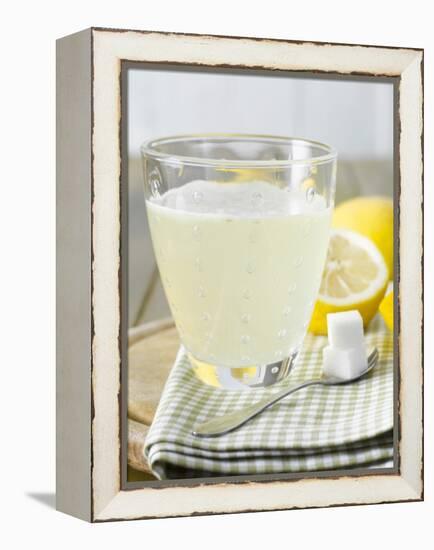 Hot Lemon with Sugar Cubes, Lemons in Background-Kai Schwabe-Framed Premier Image Canvas