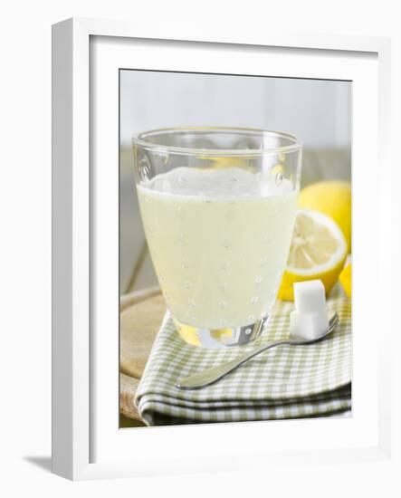 Hot Lemon with Sugar Cubes, Lemons in Background-Kai Schwabe-Framed Photographic Print