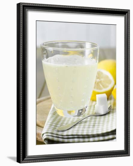 Hot Lemon with Sugar Cubes, Lemons in Background-Kai Schwabe-Framed Photographic Print
