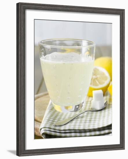 Hot Lemon with Sugar Cubes, Lemons in Background-Kai Schwabe-Framed Photographic Print