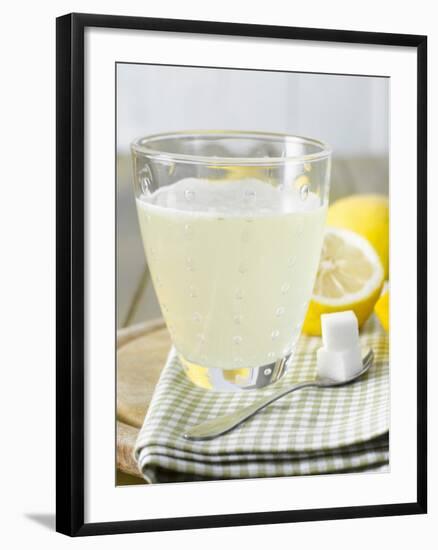 Hot Lemon with Sugar Cubes, Lemons in Background-Kai Schwabe-Framed Photographic Print