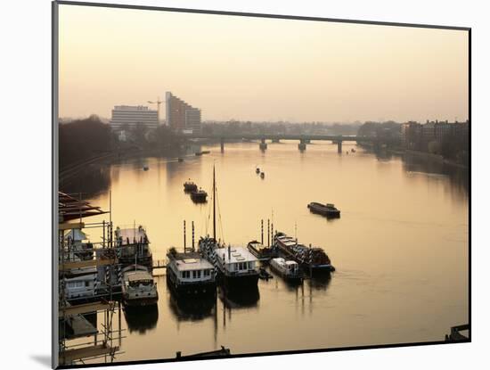 Houseboats Moored on River Thames with Putney Bridge at Sunset, Uk-Simon Warren-Mounted Photographic Print