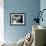 Housekeeper is Pushing a Puppy Away-null-Framed Photo displayed on a wall
