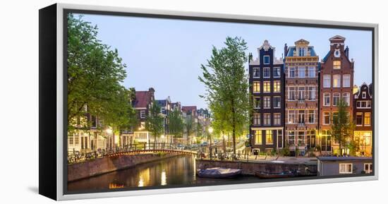 Houses Along Canal at Dusk at Intersection of Herengracht and Brouwersgracht, Amsterdam-null-Framed Stretched Canvas