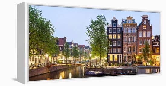 Houses Along Canal at Dusk at Intersection of Herengracht and Brouwersgracht, Amsterdam-null-Framed Stretched Canvas